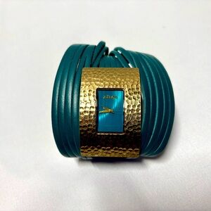 Nixon ‘The Deveaux’ Women’s Watch in Green Leather. Quartz Movement. Strap Cuff